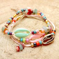 Oorbellen en armbandjes met schelpjes