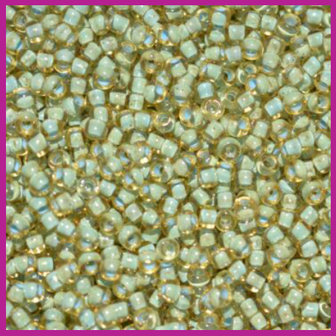 ToHo rocailles 11/0 Sea Foam Lined Topaz