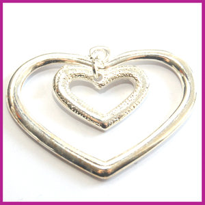 Metaal bedel hartje in hart SPL 33x45 mm